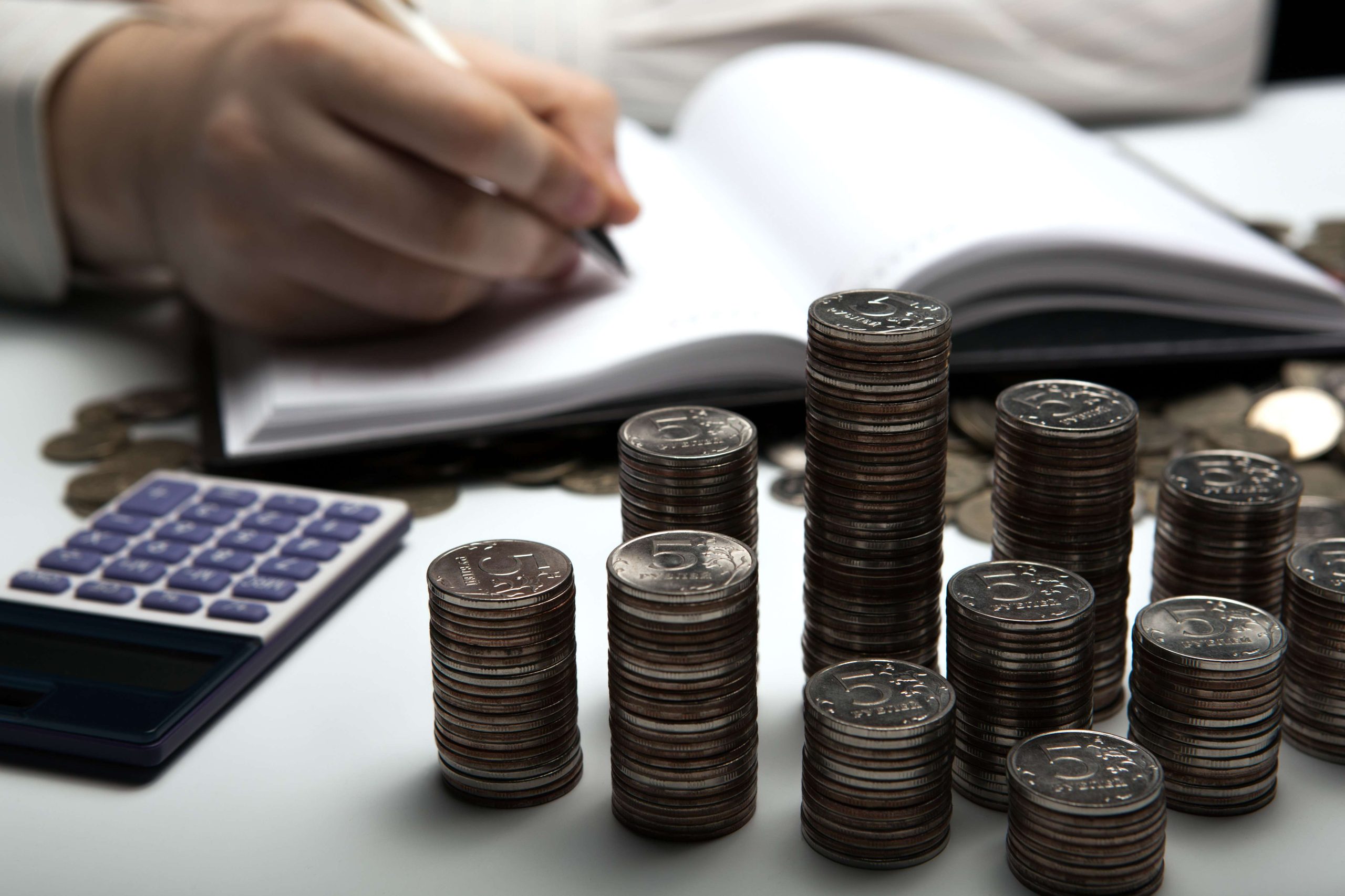 stack of Russian coins on the background of working as an accoun