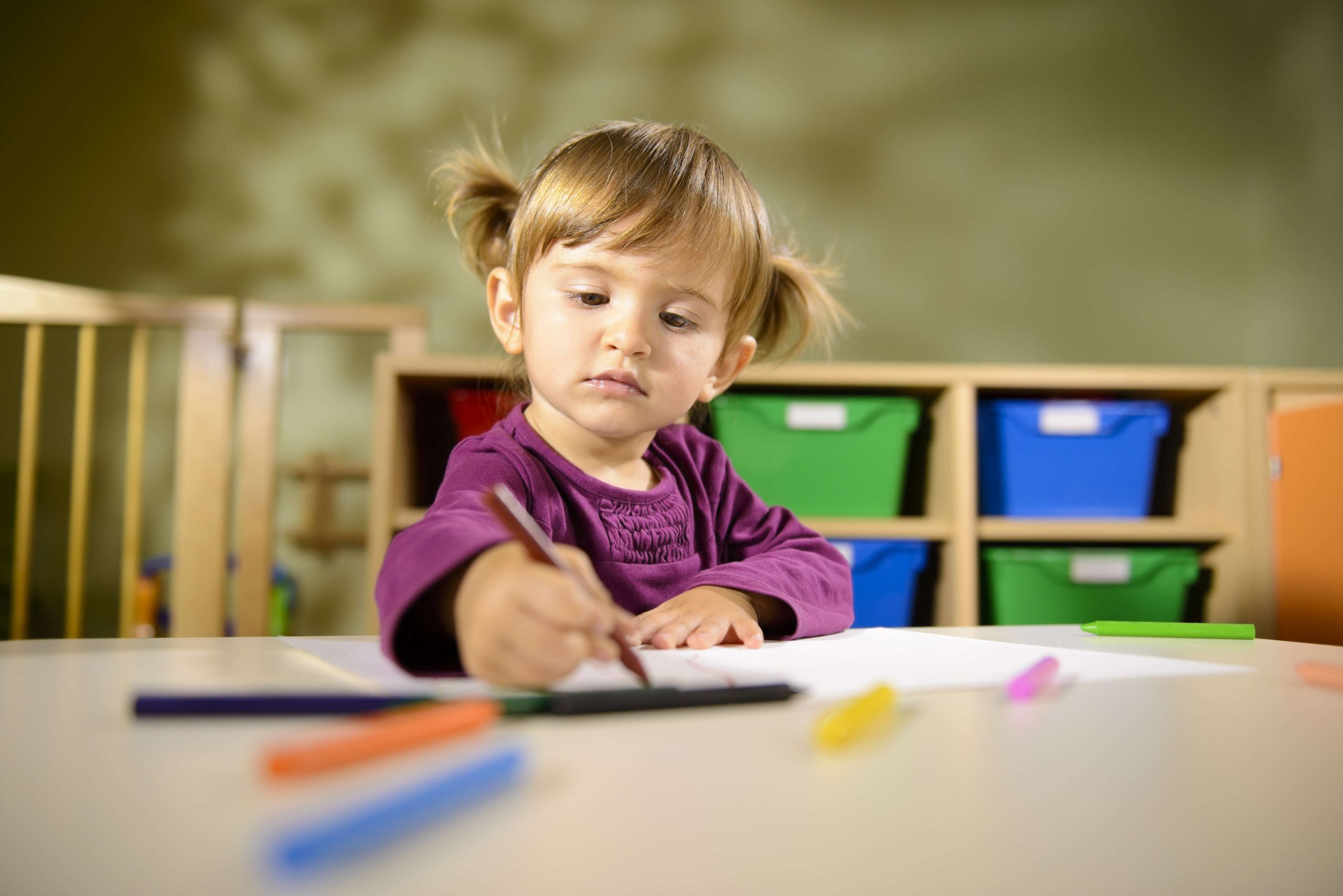 Babies and fun, child drawing at school